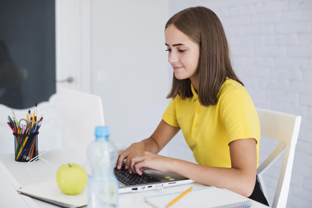 girl-working-with-laptop-room